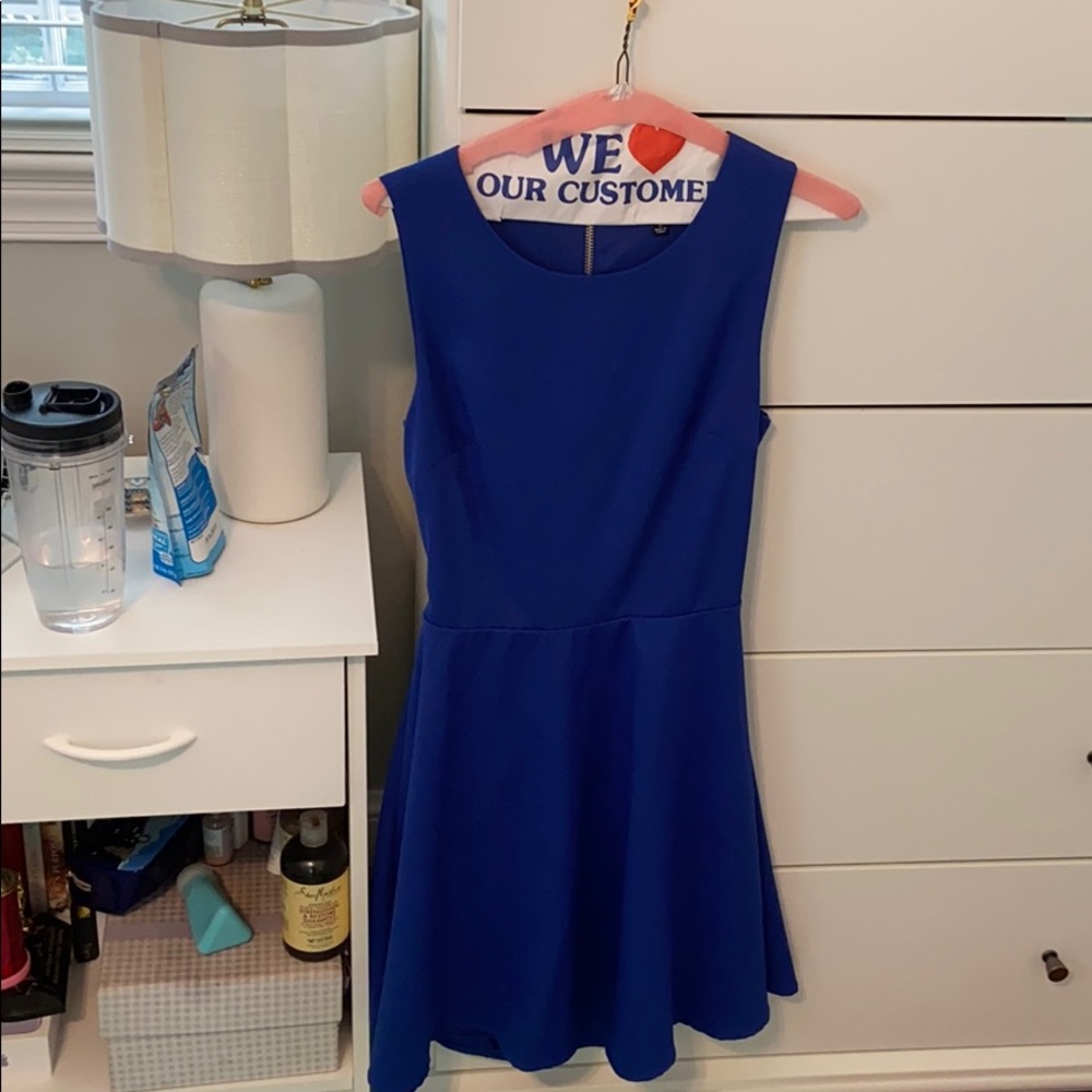 This dress has only been worn once